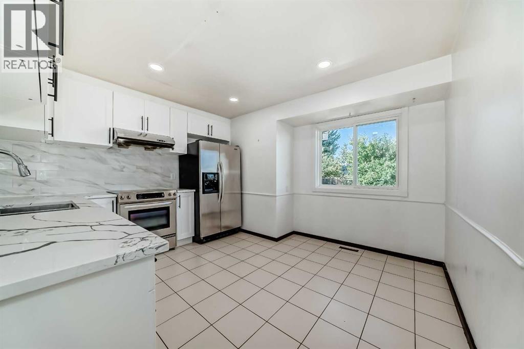 79 Bermuda Drive Nw, Calgary, Alberta  T3K 1H5 - Photo 12 - A2257528