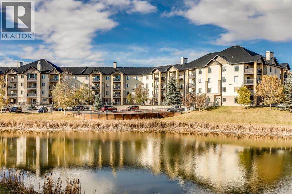 8128, 304 Mackenzie Way Sw, Airdrie, Alberta  T4B 3H8 - Photo 1 - A2274092