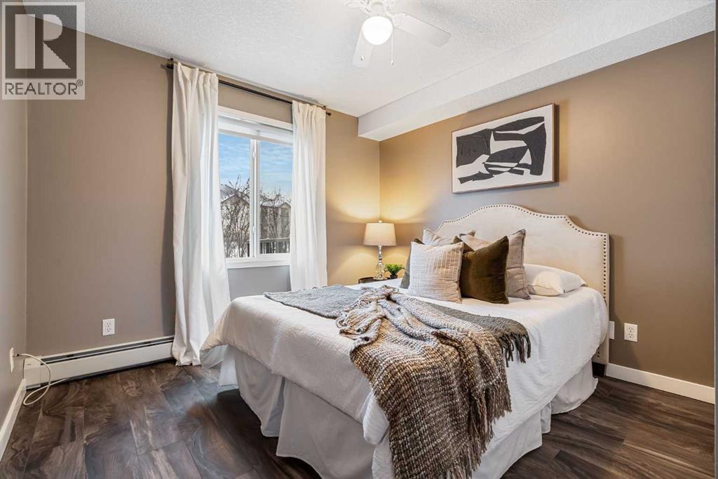 8128, 304 Mackenzie Way Sw, Airdrie, Alberta  T4B 3H8 - Photo 19 - A2274092