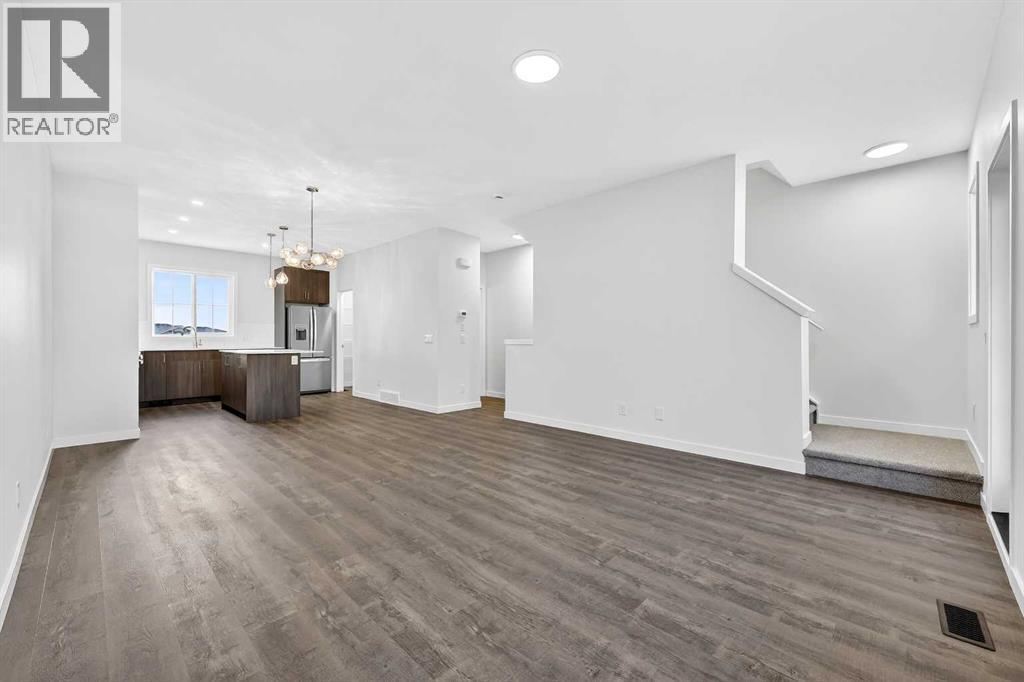 92 Creekside Drive Sw, Calgary, Alberta  T2X 6E2 - Photo 10 - A2279434