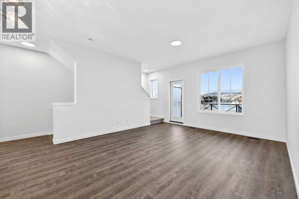 92 Creekside Drive Sw, Calgary, Alberta  T2X 6E2 - Photo 11 - A2279434