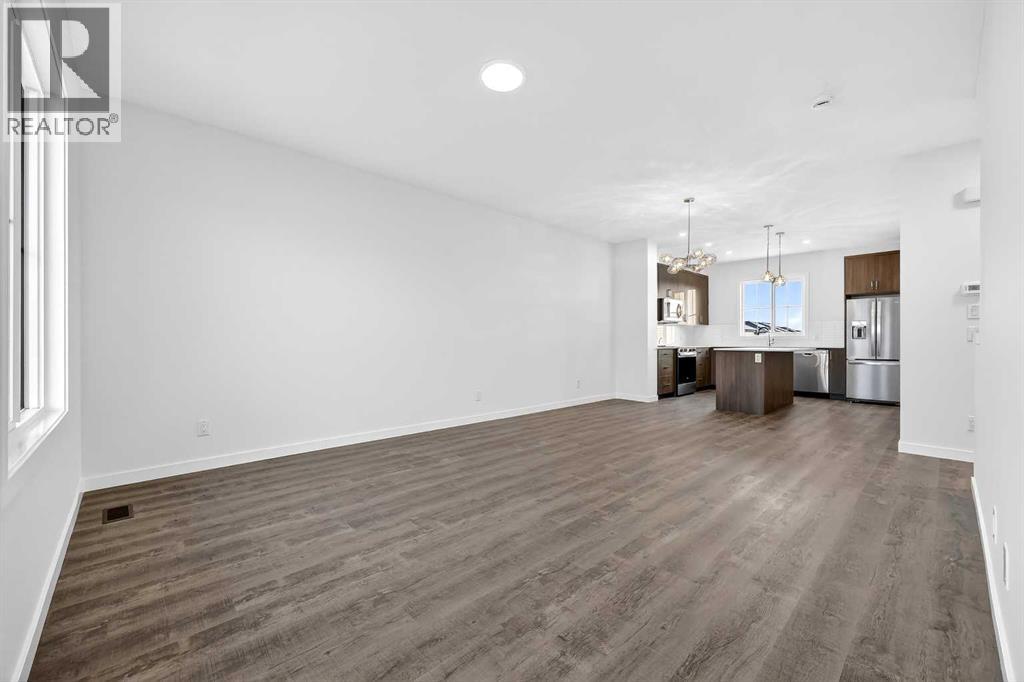 92 Creekside Drive Sw, Calgary, Alberta  T2X 6E2 - Photo 12 - A2279434