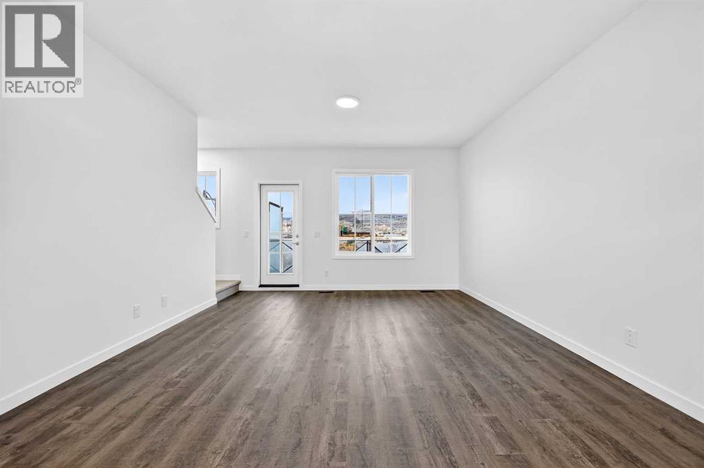 92 Creekside Drive Sw, Calgary, Alberta  T2X 6E2 - Photo 13 - A2279434