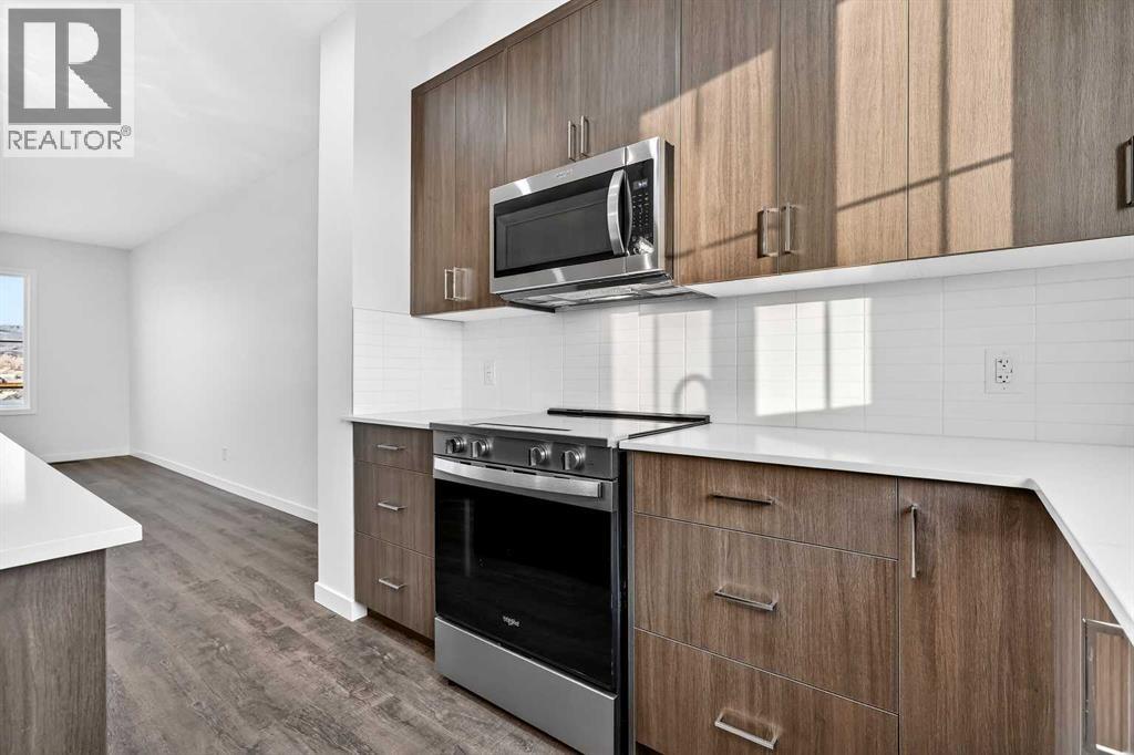 92 Creekside Drive Sw, Calgary, Alberta  T2X 6E2 - Photo 14 - A2279434