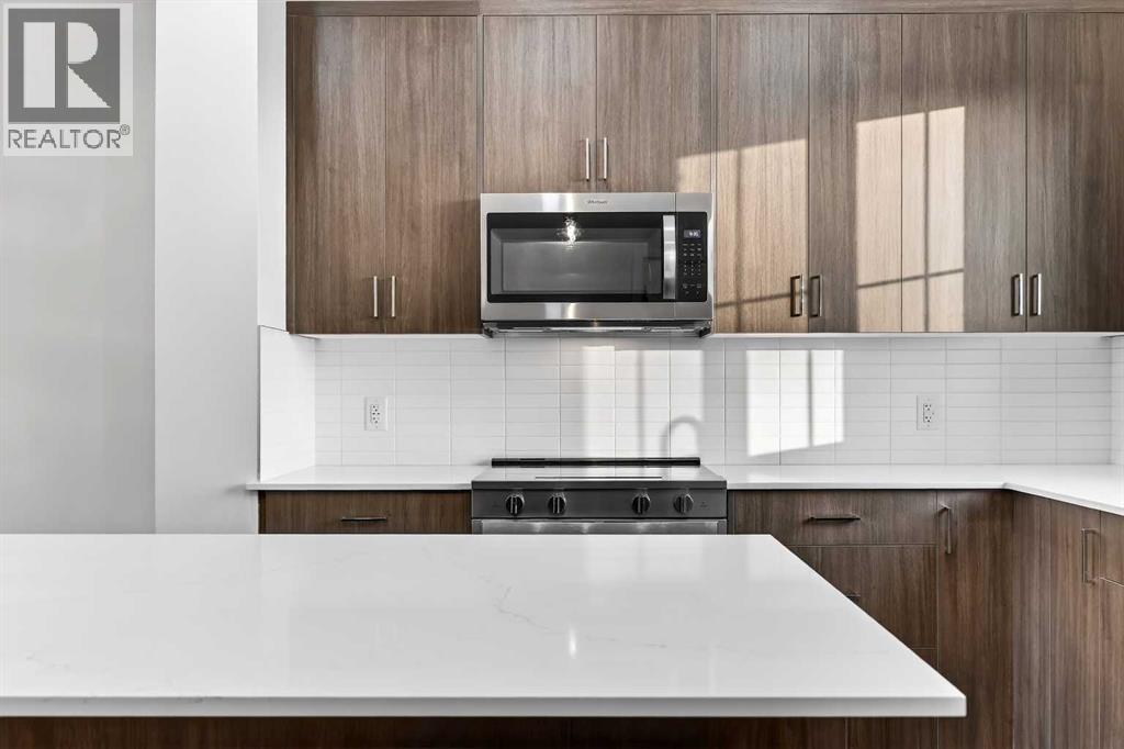 92 Creekside Drive Sw, Calgary, Alberta  T2X 6E2 - Photo 17 - A2279434