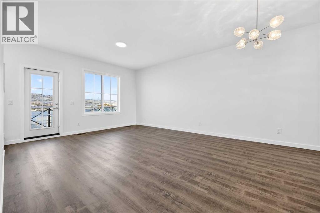 92 Creekside Drive Sw, Calgary, Alberta  T2X 6E2 - Photo 2 - A2279434