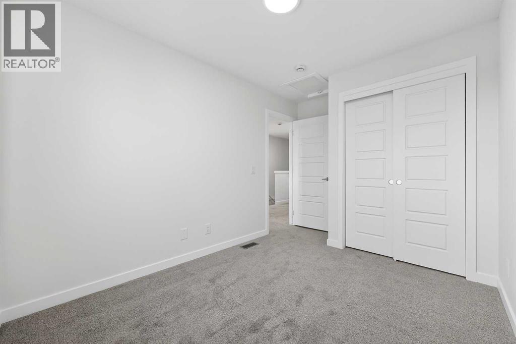 92 Creekside Drive Sw, Calgary, Alberta  T2X 6E2 - Photo 32 - A2279434