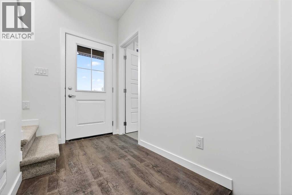 92 Creekside Drive Sw, Calgary, Alberta  T2X 6E2 - Photo 6 - A2279434