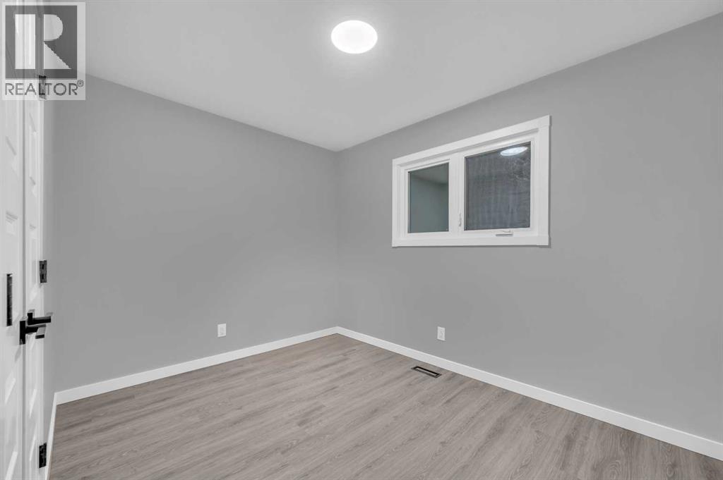 5868 Dalcastle Drive Nw, Calgary, Alberta  T3A 2B6 - Photo 23 - A2274677