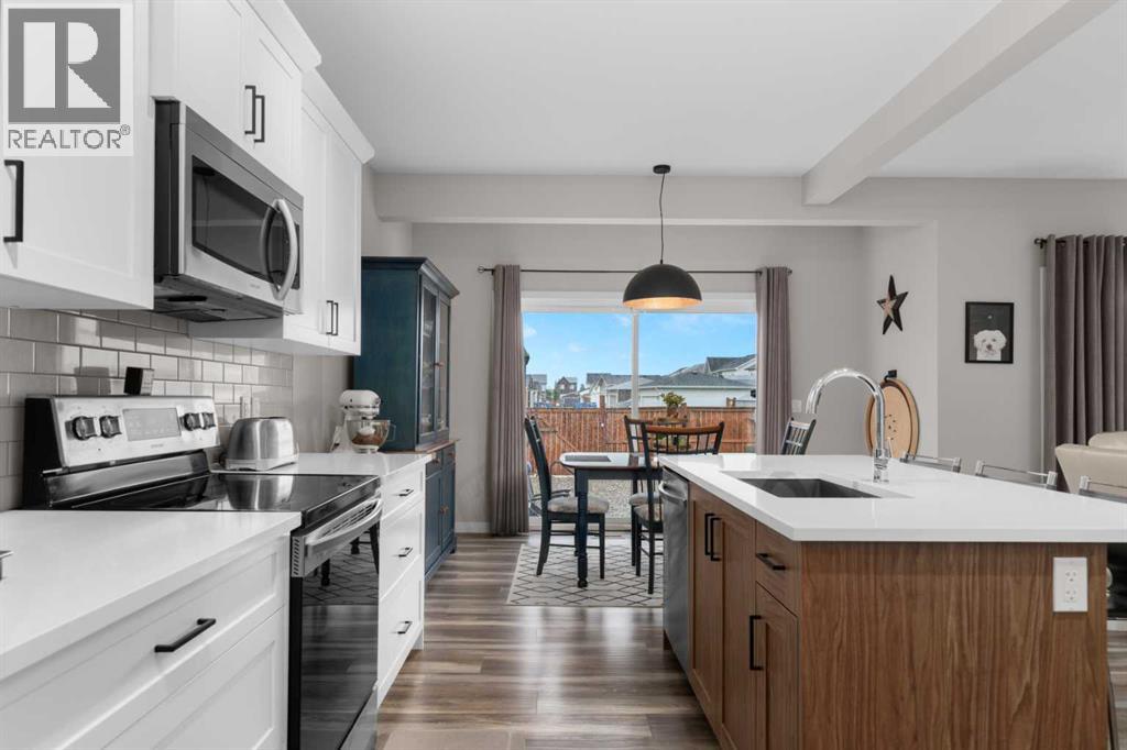 113 Amery Crescent, Crossfield, Alberta  T0M 0S0 - Photo 4 - A2268478