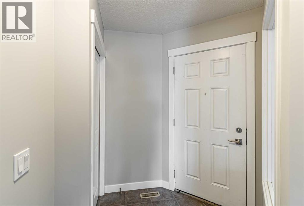 173 Silverado Plains Close Sw, Calgary, Alberta  T2X 0G4 - Photo 3 - A2278761