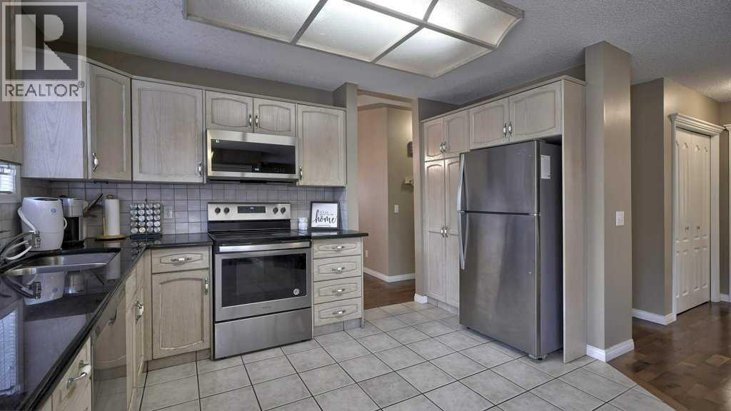 138 Sierra Morena Green Sw, Calgary, Alberta  T3H 3E4 - Photo 12 - A2268938