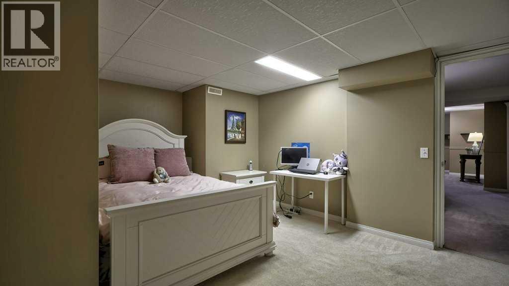 138 Sierra Morena Green Sw, Calgary, Alberta  T3H 3E4 - Photo 36 - A2268938