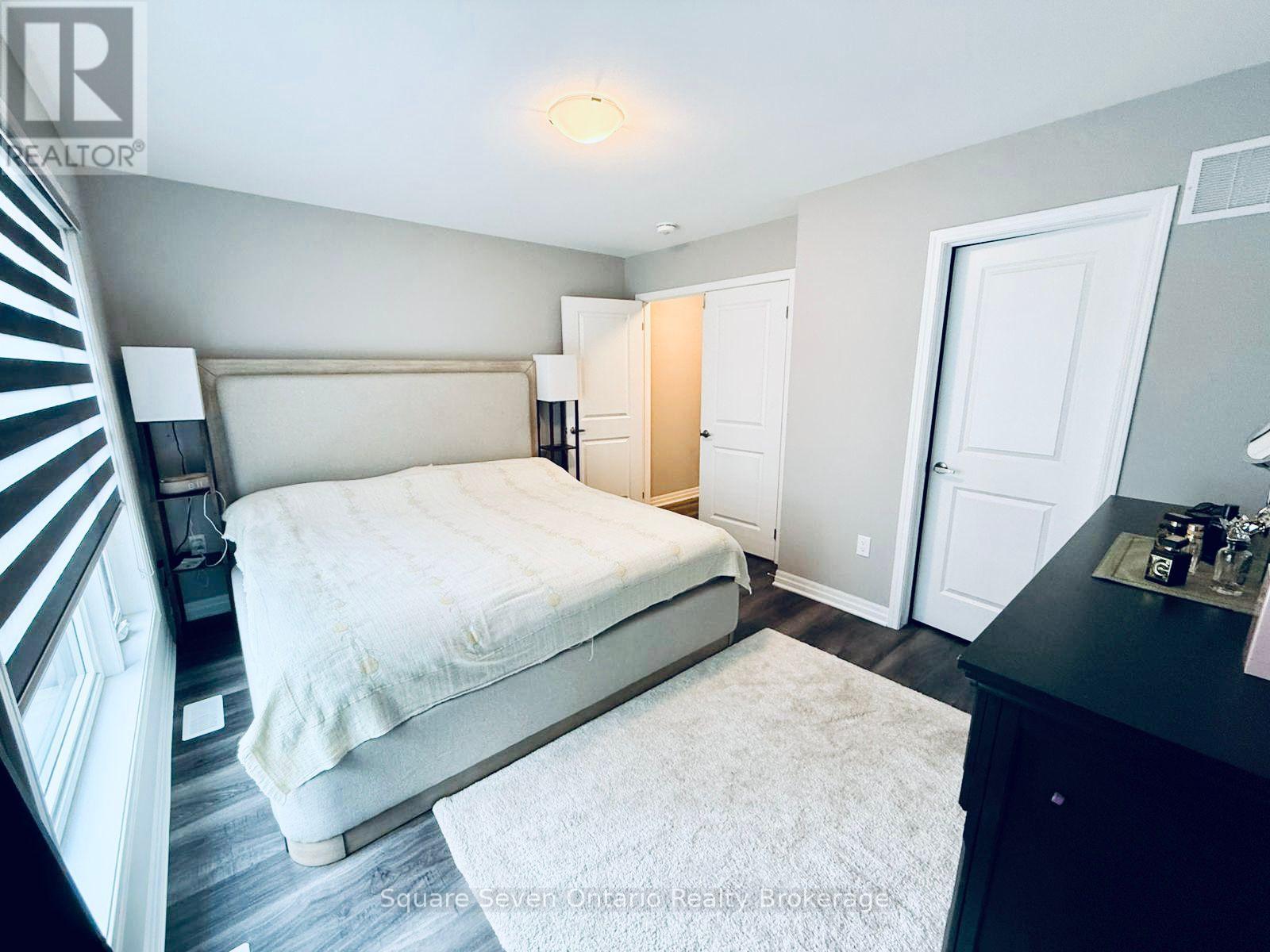 60 Kaitting Trail, Oakville, Ontario  L6M 5N5 - Photo 6 - W12701648