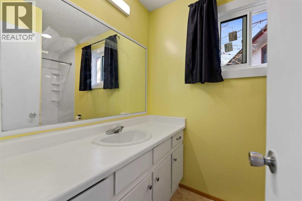 124 Falwood Crescent Ne, Calgary, Alberta  T3J 1E3 - Photo 18 - A2279618