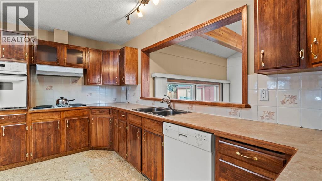 928 120 Avenue Se, Calgary, Alberta  T2J 2K7 - Photo 9 - A2279401