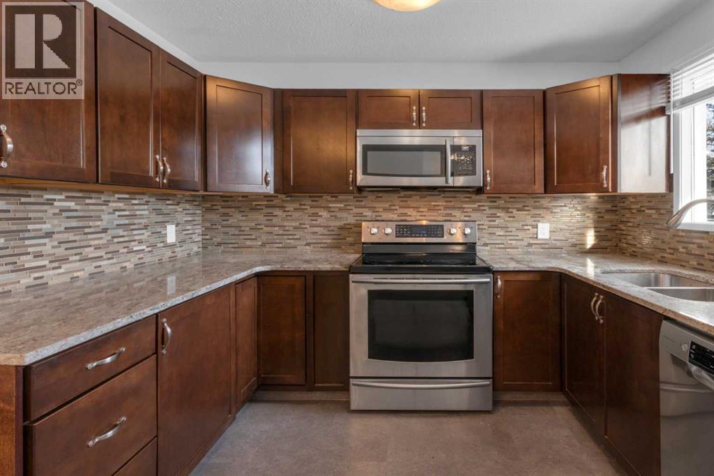 6312 Thorncliffe Drive Nw, Calgary, Alberta  T2K 3A7 - Photo 8 - A2278293