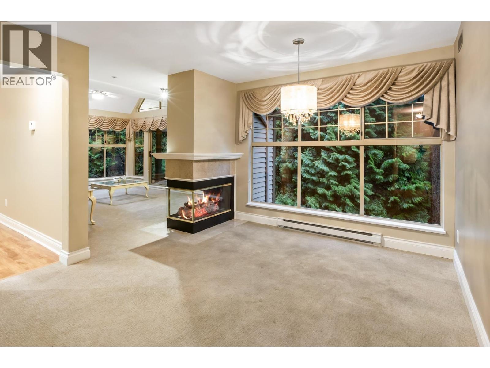 303 180 Ravine Drive, Port Moody, British Columbia  V3H 4Z3 - Photo 4 - R3080039