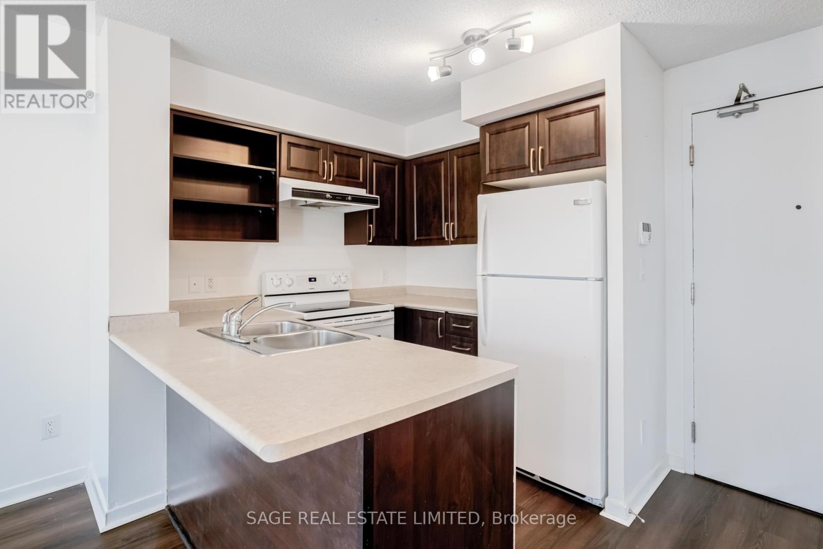 310 - 120 Dallimore Circle, Toronto, Ontario  M3C 4J1 - Photo 7 - C12682704