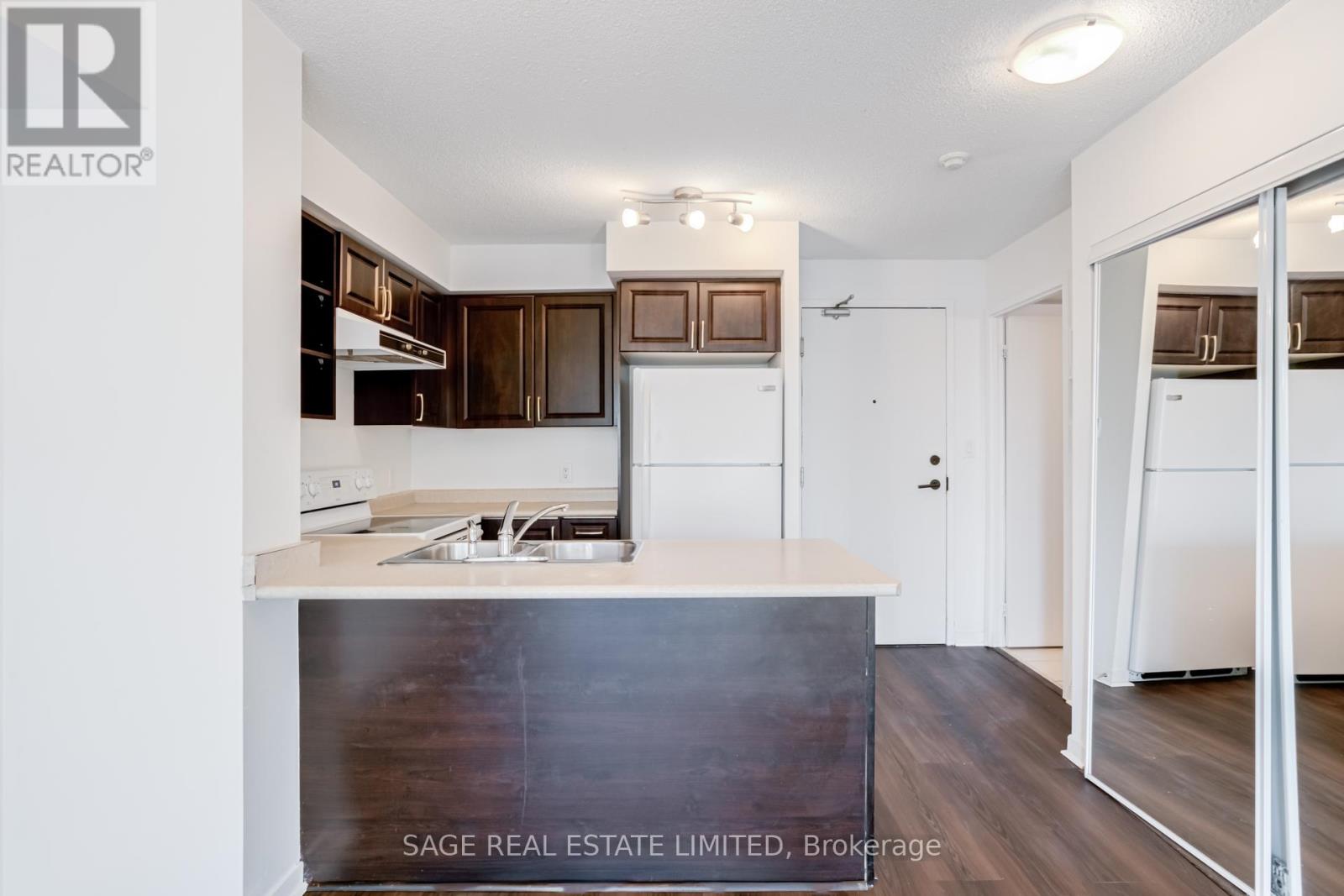 310 - 120 Dallimore Circle, Toronto, Ontario  M3C 4J1 - Photo 6 - C12682704