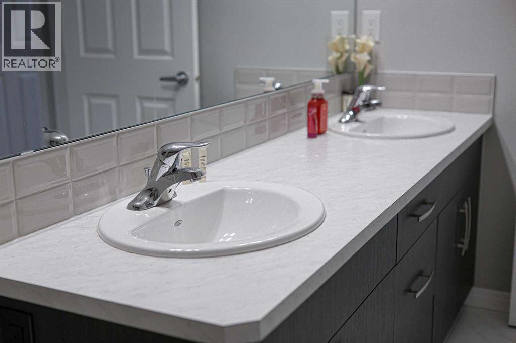 231 Windford Crescent Sw, Airdrie, Alberta  T4B 5E5 - Photo 22 - A2279446