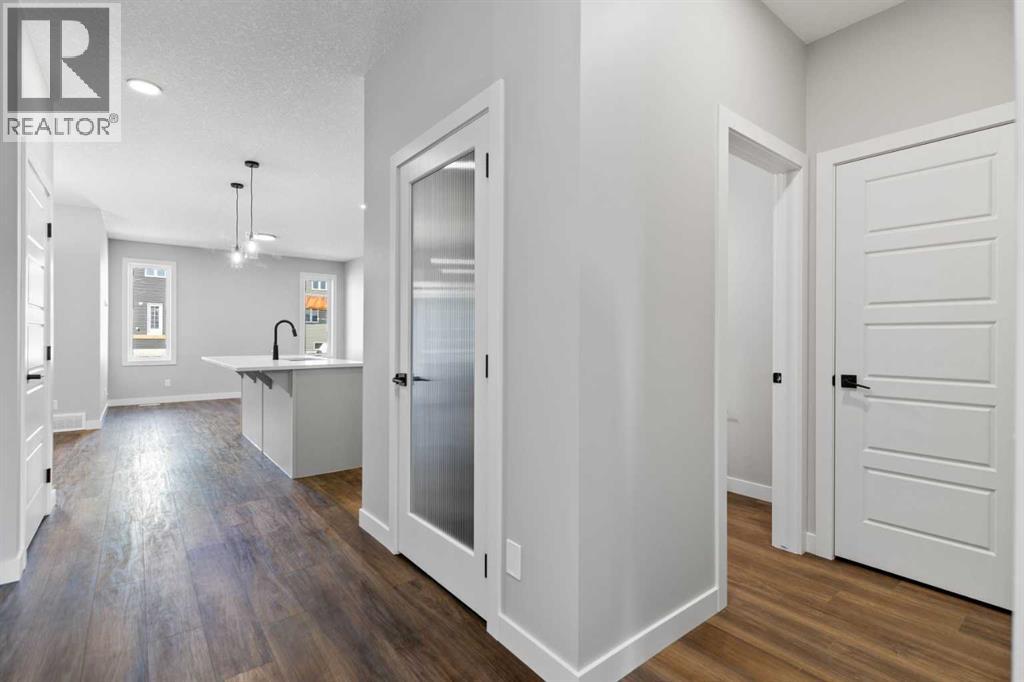 65 Amblefield Heights Nw, Calgary, Alberta  T3P 2K1 - Photo 9 - A2269561