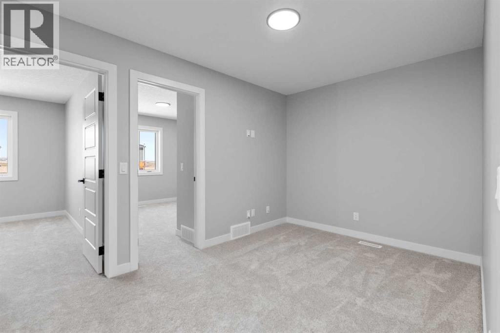 65 Amblefield Heights Nw, Calgary, Alberta  T3P 2K1 - Photo 29 - A2269561