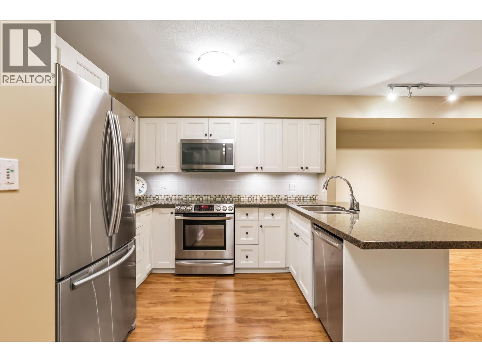 303 180 Ravine Drive, Port Moody, British Columbia  V3H 4Z3 - Photo 6 - R3080039