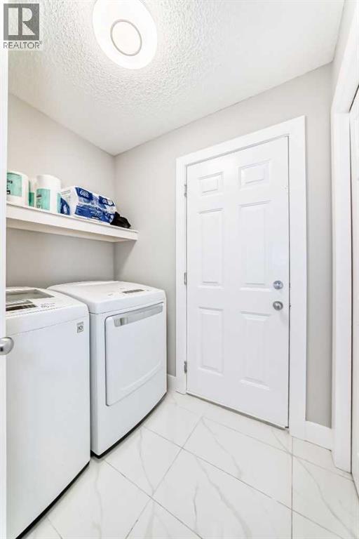 24 Copperfield Manor Se, Calgary, Alberta  T2Z 4R7 - Photo 12 - A2267157