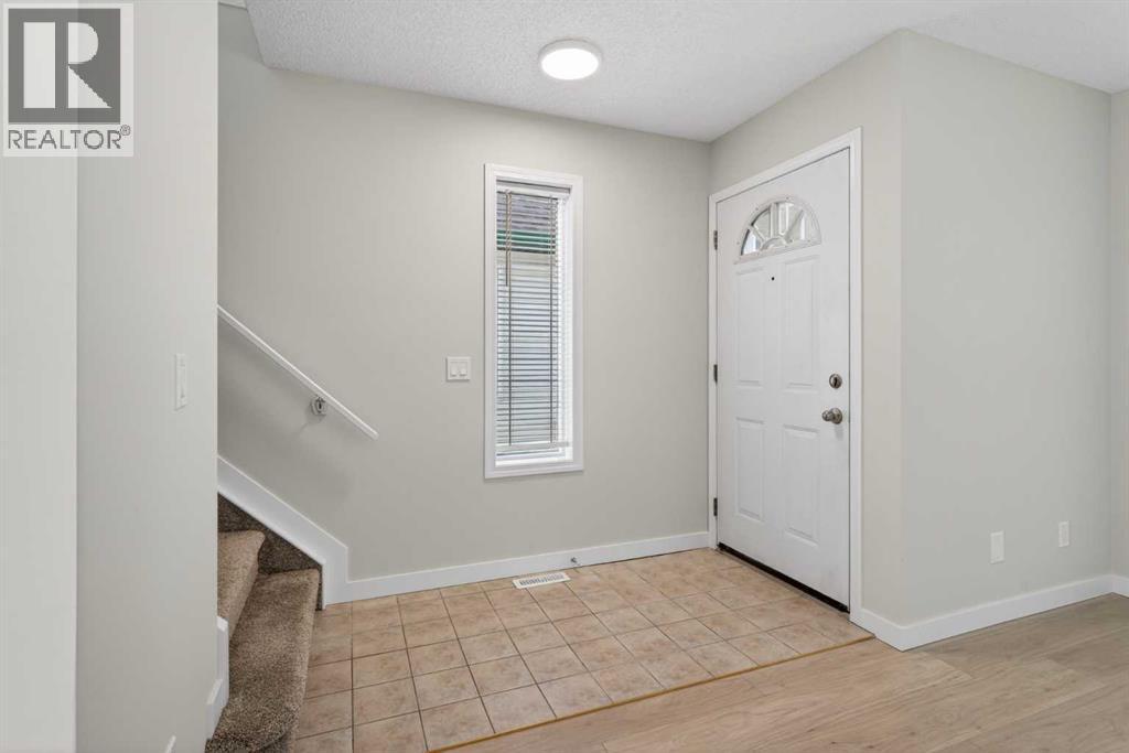 186 Harvest Rose Circle Ne, Calgary, Alberta  T3K 4M7 - Photo 4 - A2279717