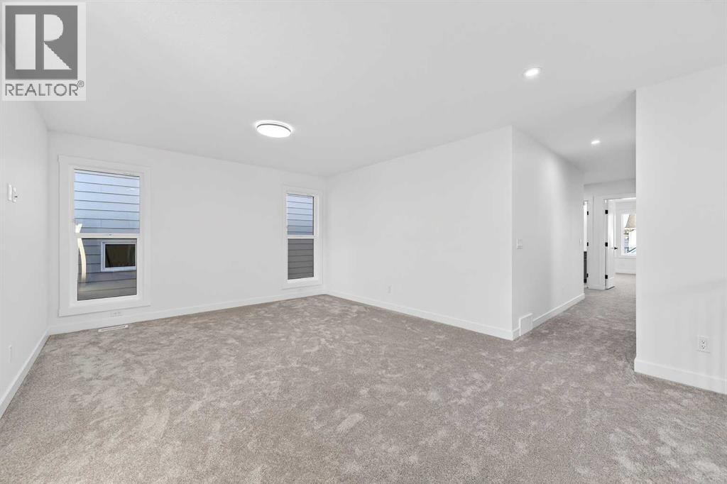 29 Rowmont Common Nw, Calgary, Alberta  T3L 0L4 - Photo 19 - A2277545