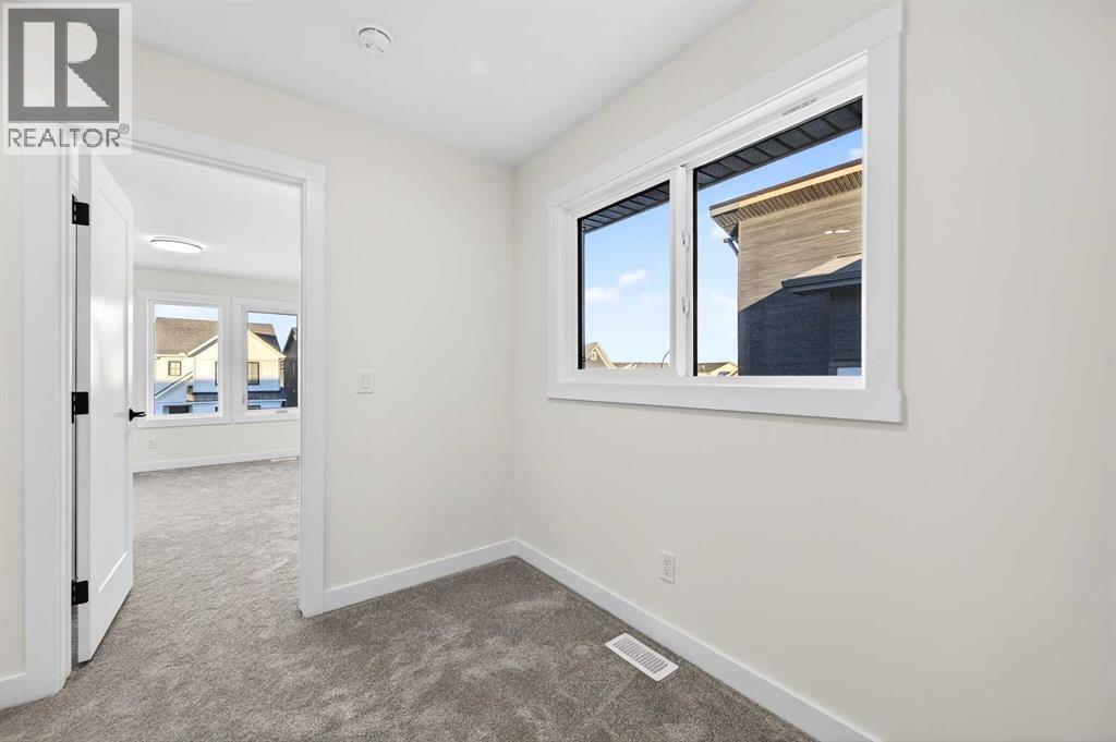 29 Rowmont Common Nw, Calgary, Alberta  T3L 0L4 - Photo 27 - A2277545