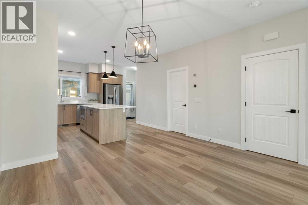 99 Edith Passage Nw, Calgary, Alberta  T3R 2B5 - Photo 13 - A2278688