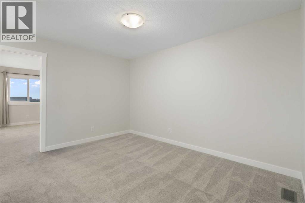 99 Edith Passage Nw, Calgary, Alberta  T3R 2B5 - Photo 27 - A2278688