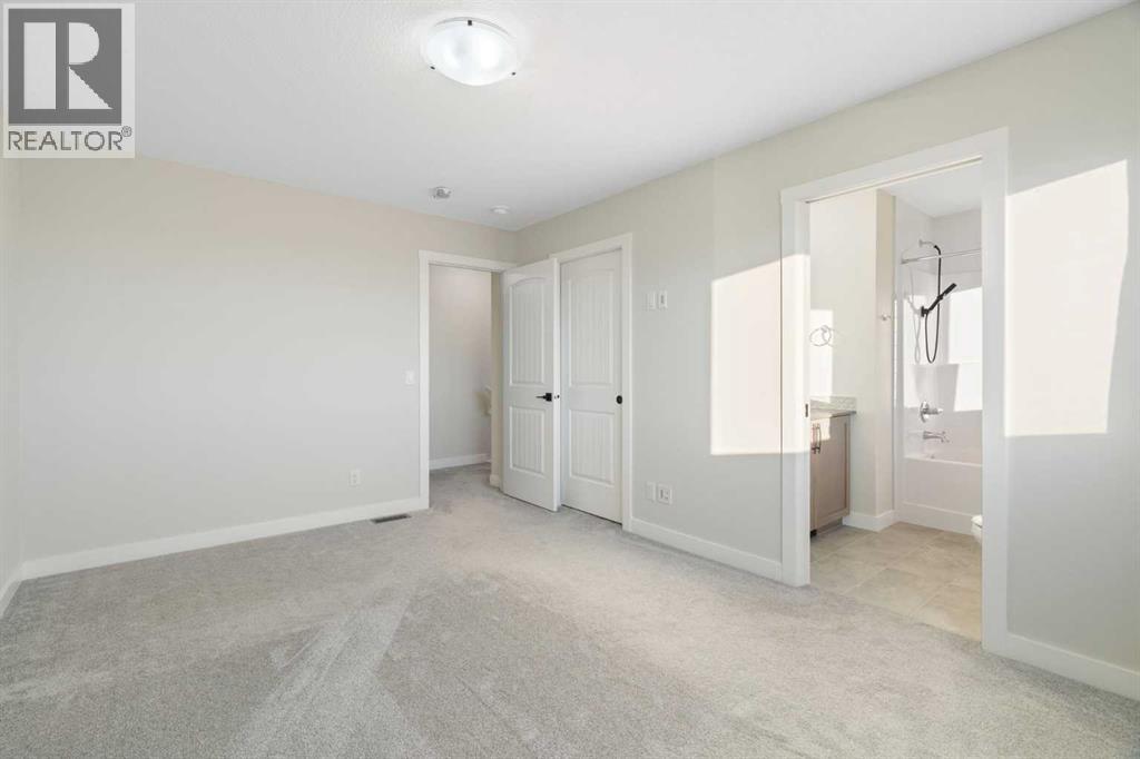 99 Edith Passage Nw, Calgary, Alberta  T3R 2B5 - Photo 35 - A2278688