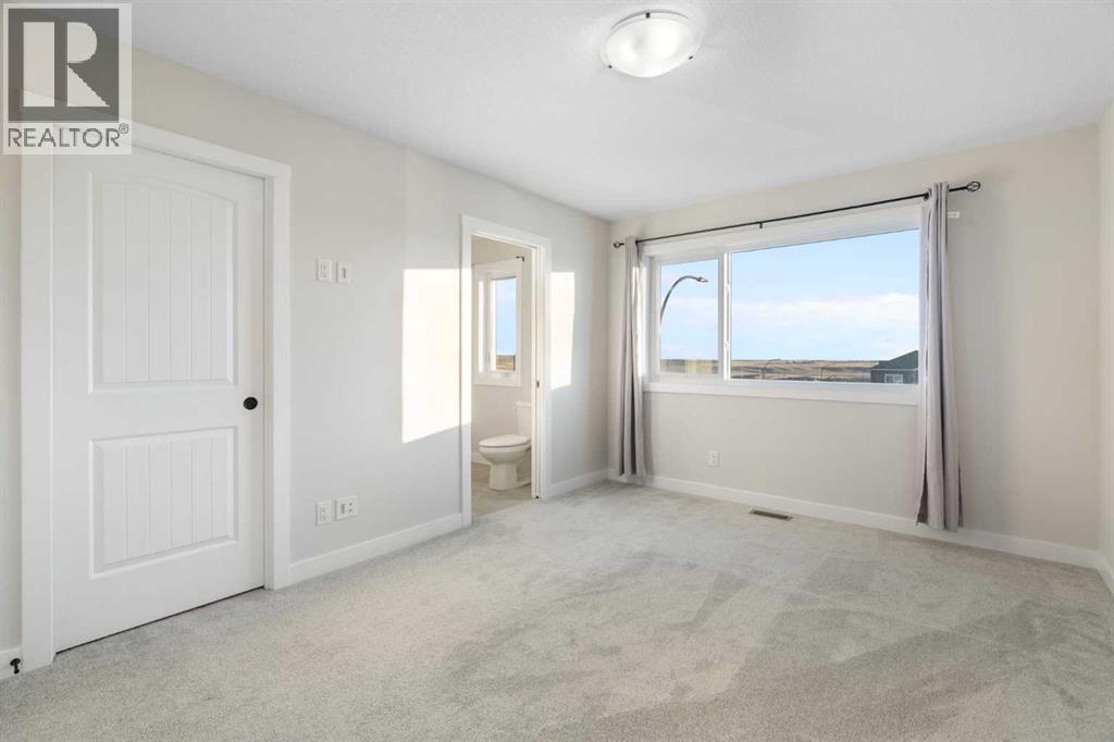 99 Edith Passage Nw, Calgary, Alberta  T3R 2B5 - Photo 36 - A2278688