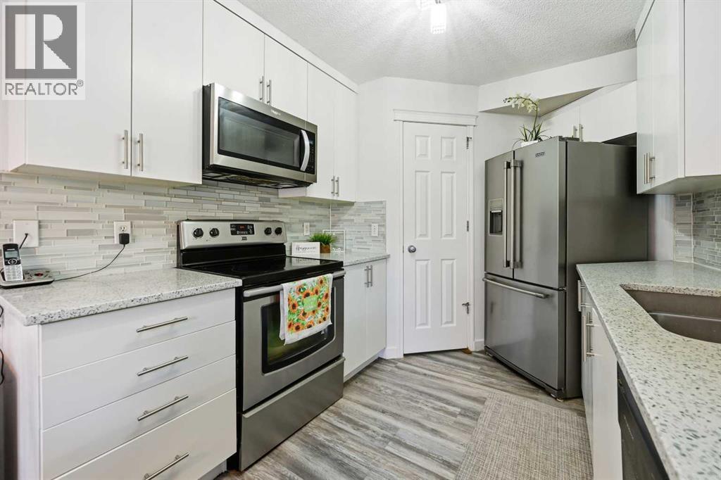 58 Bridlecrest Road Sw, Calgary, Alberta  T2Y 5J2 - Photo 8 - A2279724