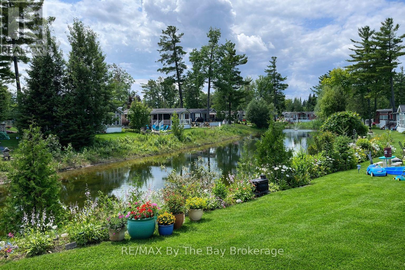 15 Kenora Trail, Wasaga Beach, Ontario  L9Z 1X7 - Photo 3 - S12702762