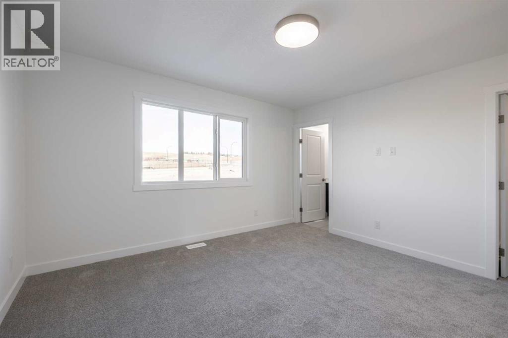 51 Heritage Manor, Cochrane, Alberta  T4C 0L3 - Photo 19 - A2264616