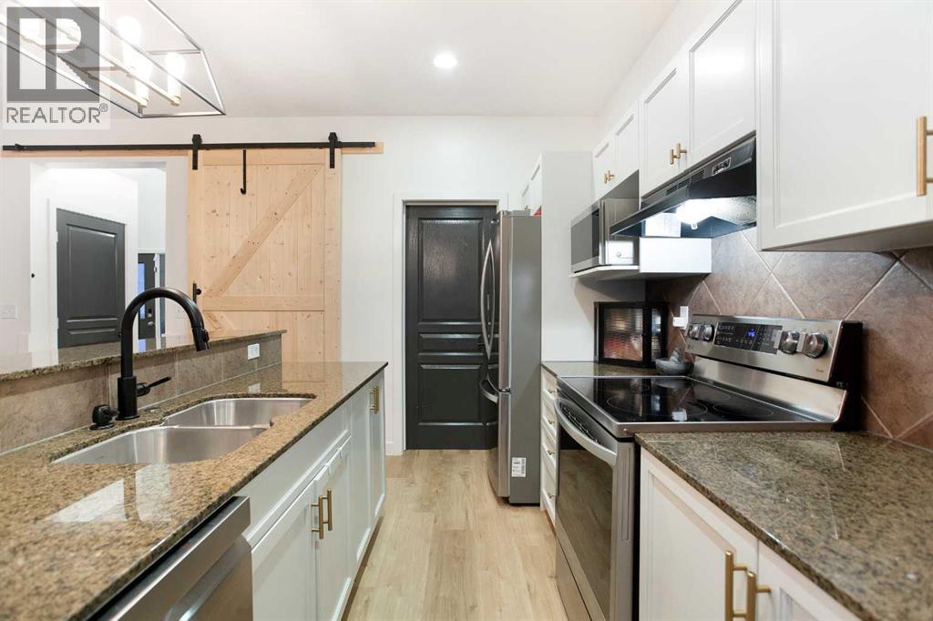 1020 Prairie Springs Hill Sw, Airdrie, Alberta  T4B 0E9 - Photo 11 - A2269969