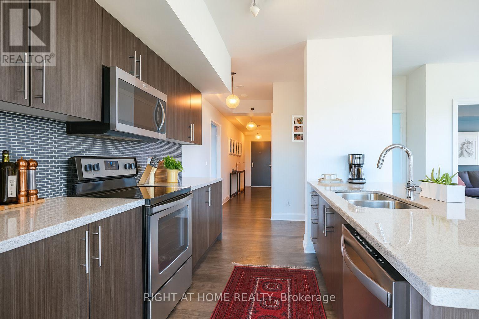 1603 - 55 Speers Road, Oakville, Ontario  L6K 0H9 - Photo 5 - W12455777