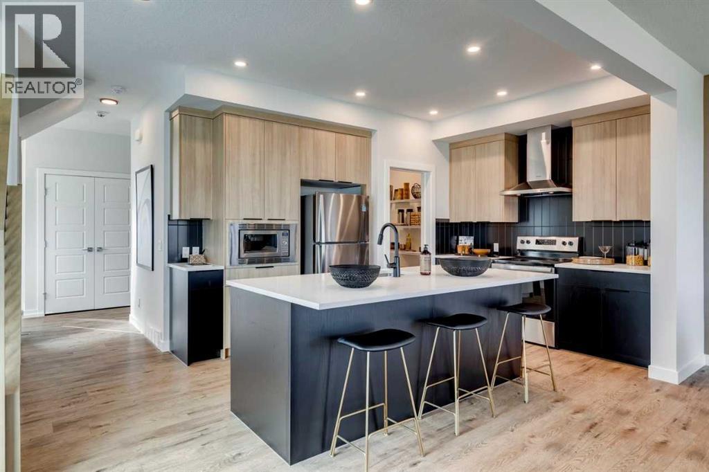 12 Aster Link, Okotoks, Alberta  T1S 5Y1 - Photo 2 - A2271624