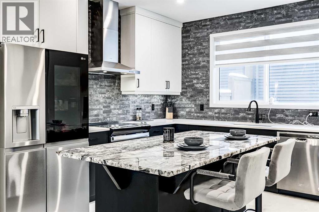 184 Rowmont Boulevard Nw, Calgary, Alberta  T3L 0H3 - Photo 2 - A2273470