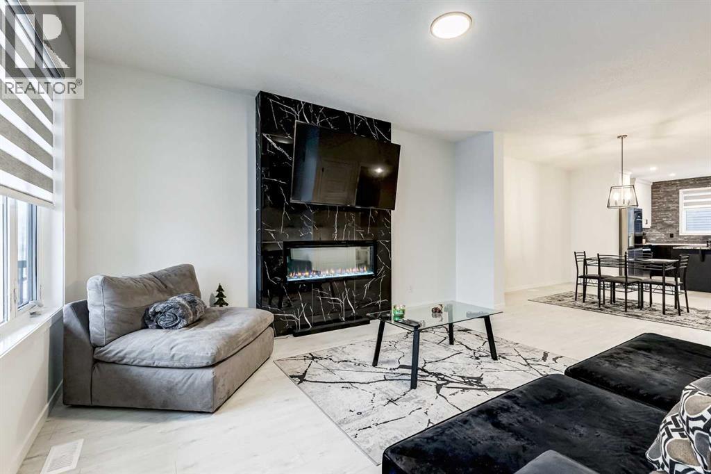 184 Rowmont Boulevard Nw, Calgary, Alberta  T3L 0H3 - Photo 4 - A2273470