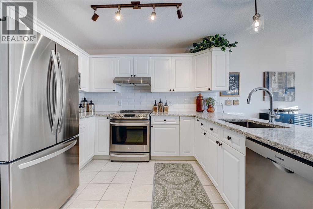 6558 Sierra Morena Boulevard Sw, Calgary, Alberta  T3H 3R3 - Photo 11 - A2278161