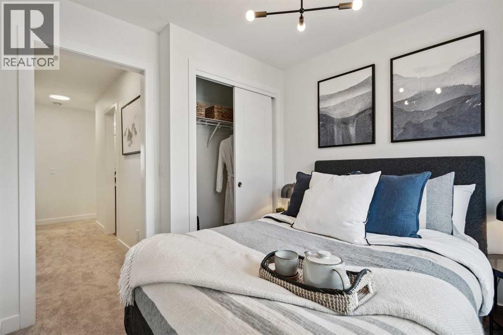 132 Quesnay Wood Link Sw, Calgary, Alberta  T3E 8H6 - Photo 27 - A2272579