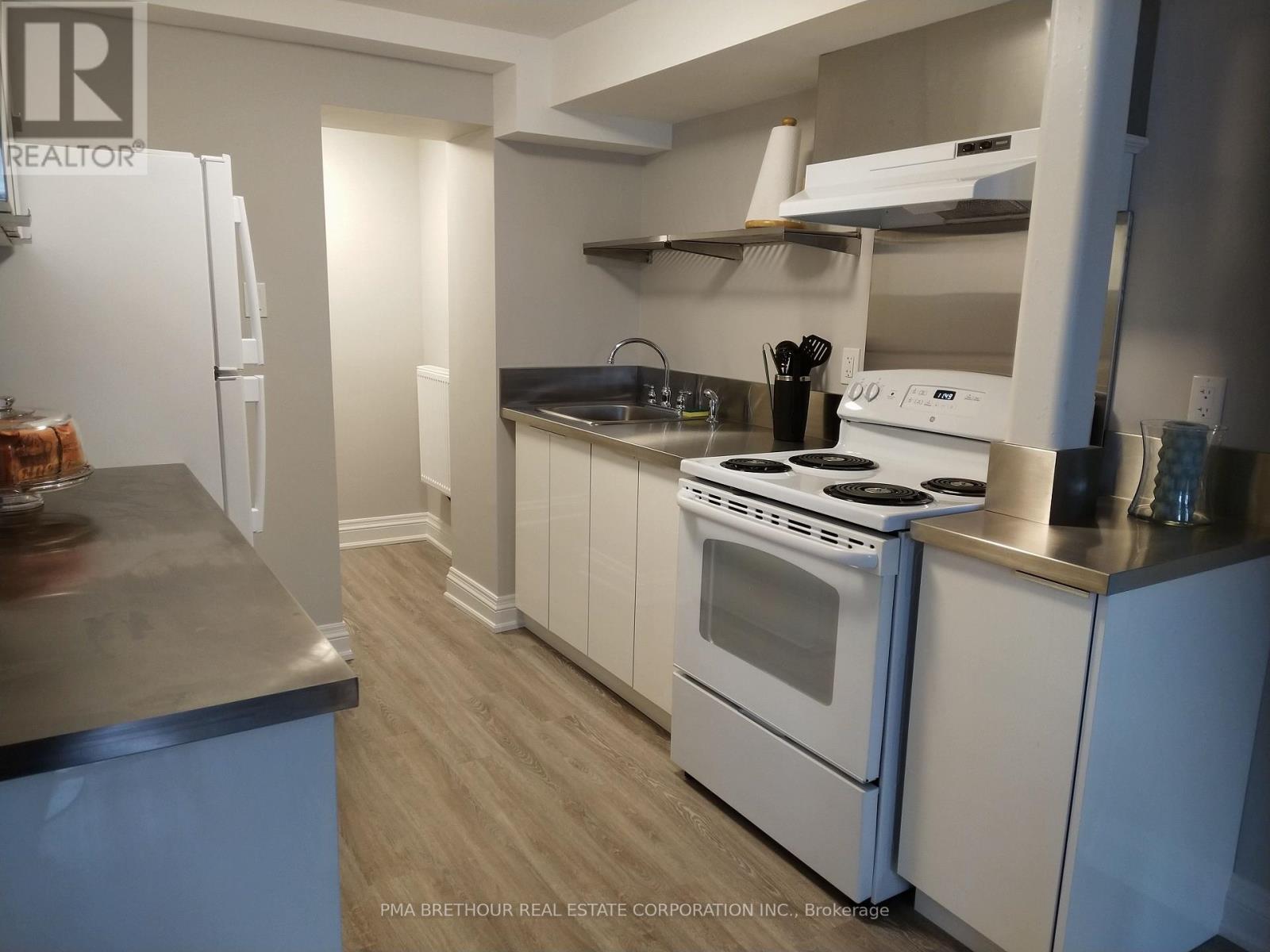 67 Cartwright Avenue, Toronto, Ontario  M6A 1V1 - Photo 6 - W12584296