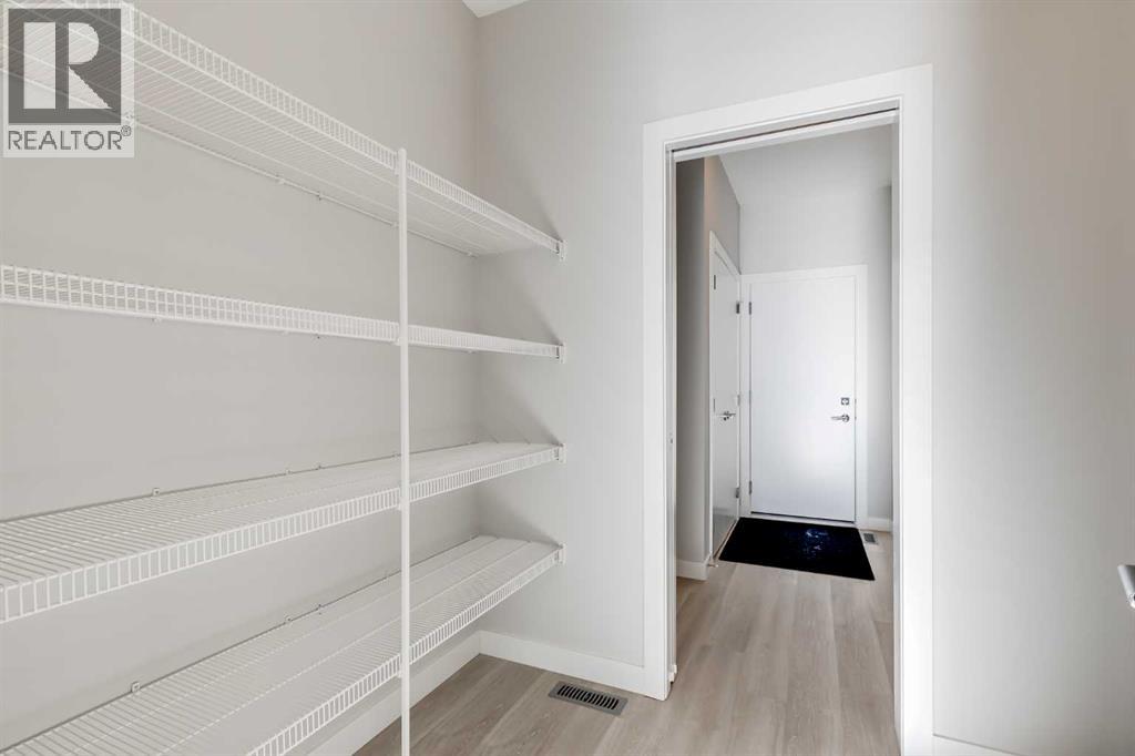 1309 South Point Parade SW, Airdrie, Alberta  T4B 5H9 - Photo 8 - A2274293