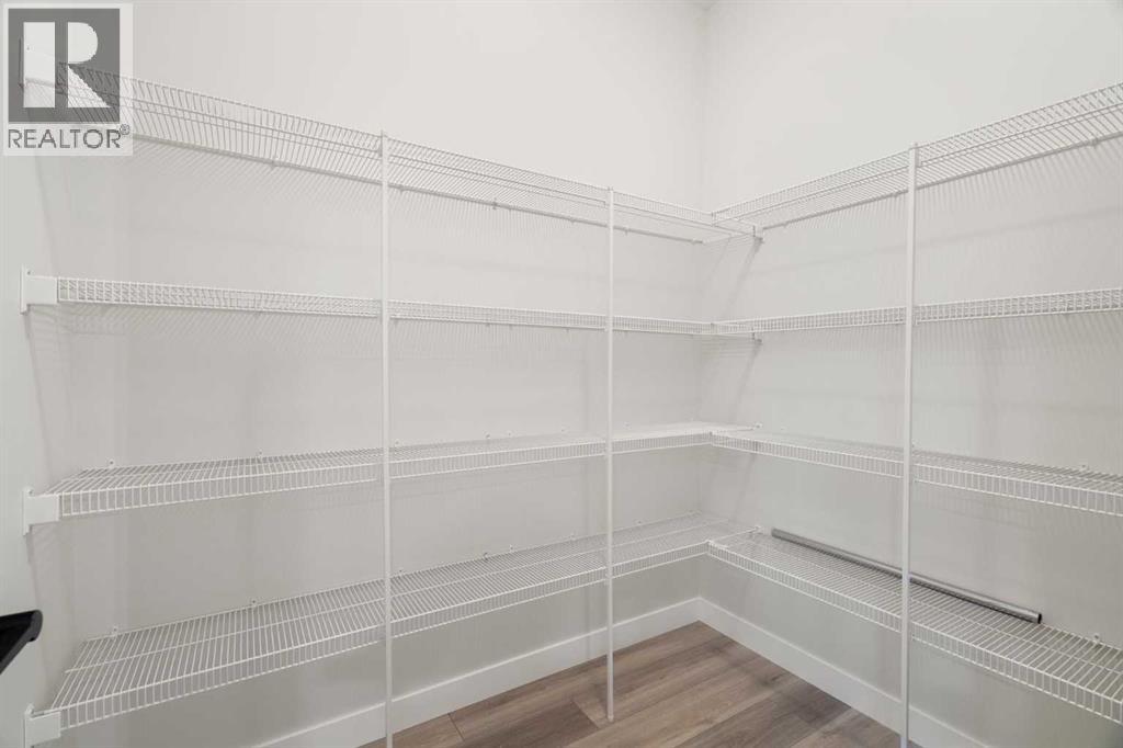 99 Edith Passage Nw, Calgary, Alberta  T3R 2B5 - Photo 15 - A2278688