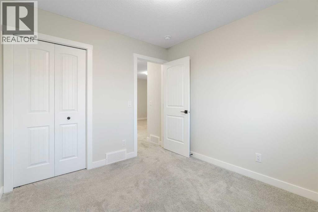 99 Edith Passage Nw, Calgary, Alberta  T3R 2B5 - Photo 31 - A2278688